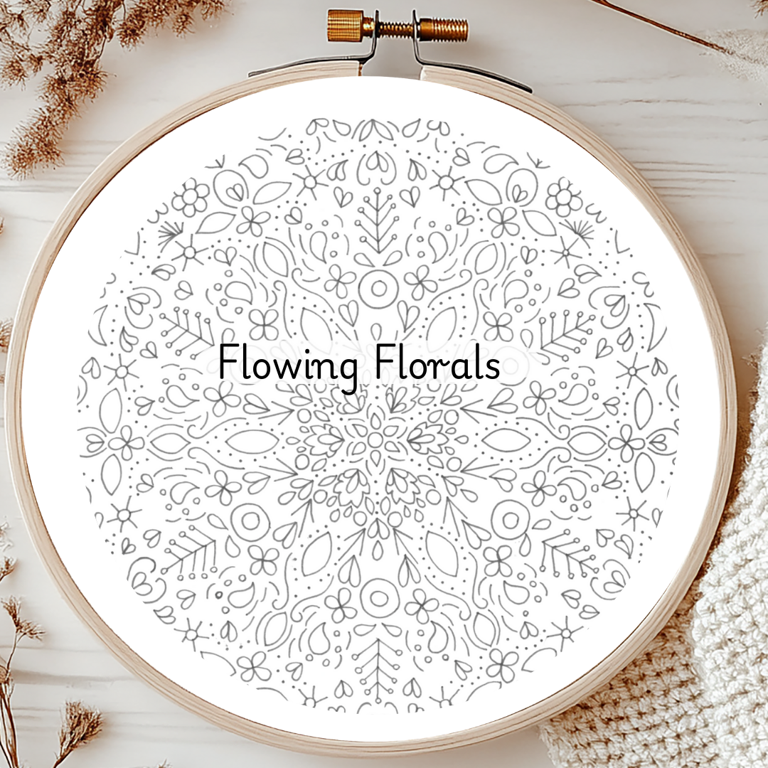 Embroidery hoop with 'Flowing Florals' pattern on a white background