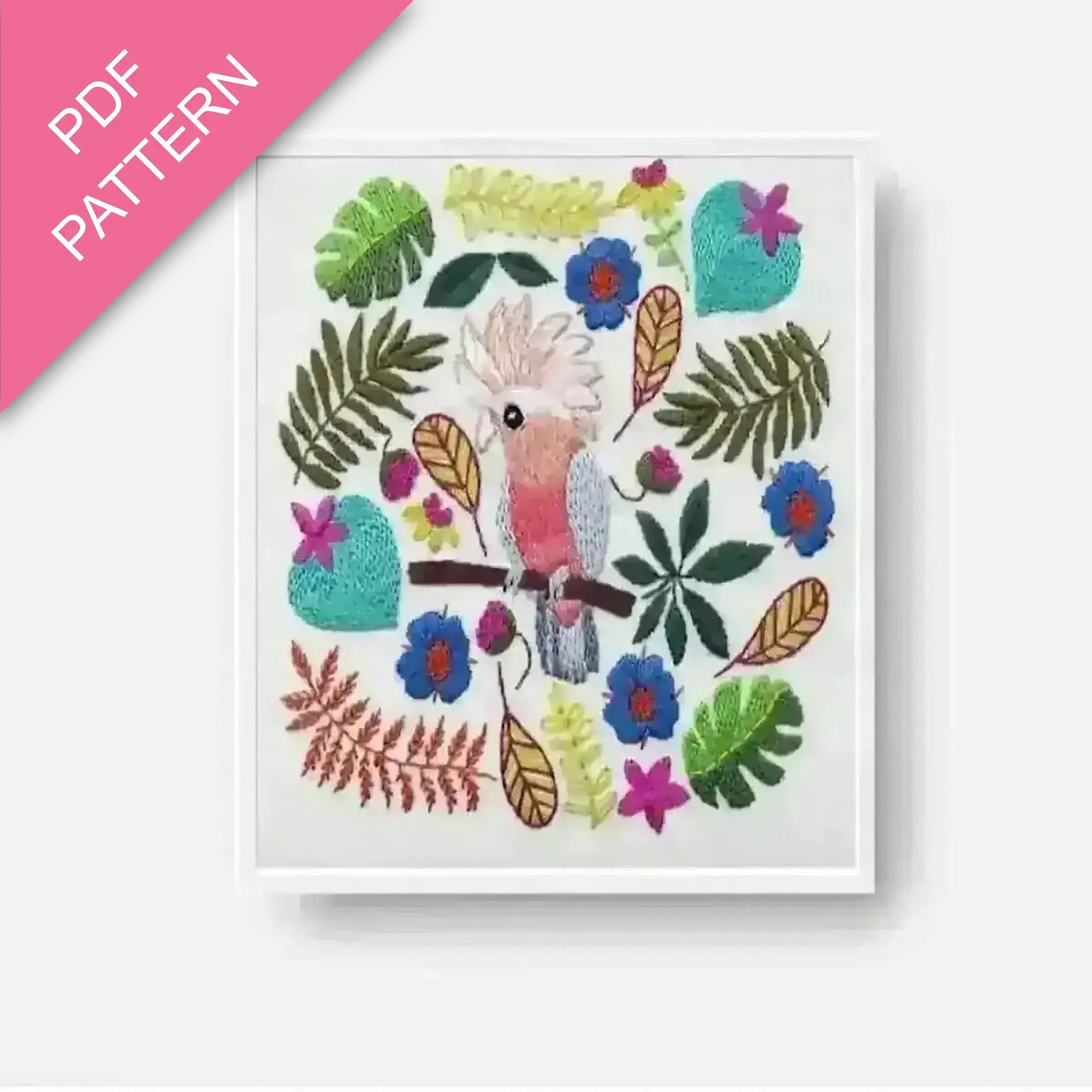 Embroidery pattern with a galah bird and floral design on a white background