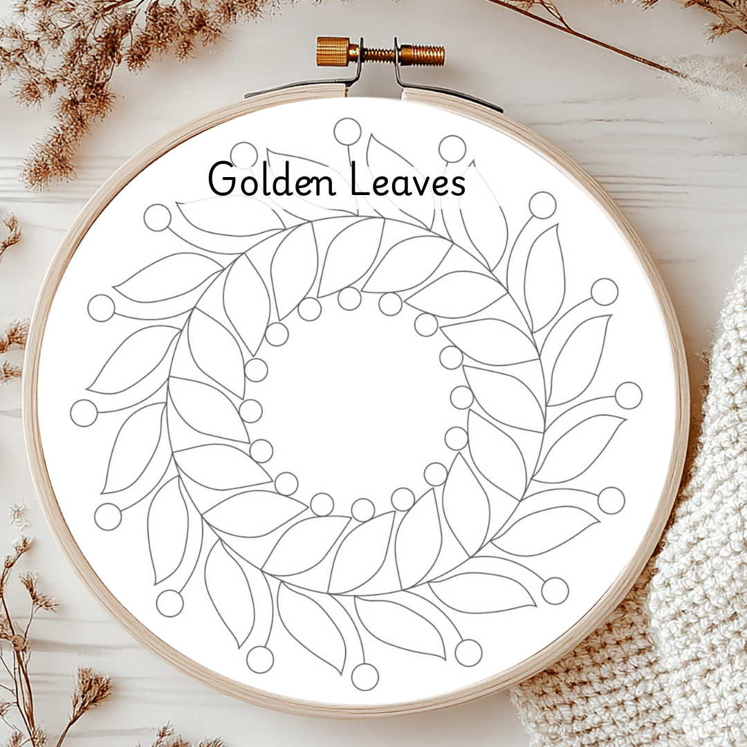 Embroidery hoop with 'Golden Leaves' design on a white background