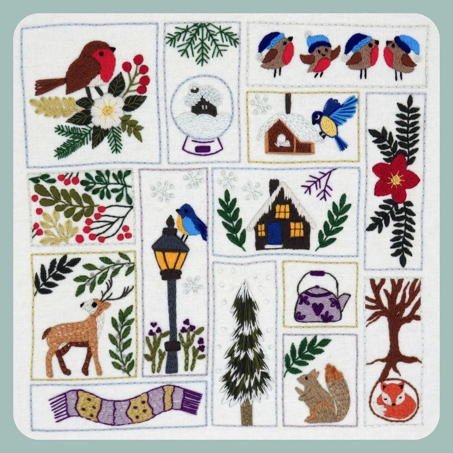 Collection of embroidered patches with various nature-themed designs on a light blue background.