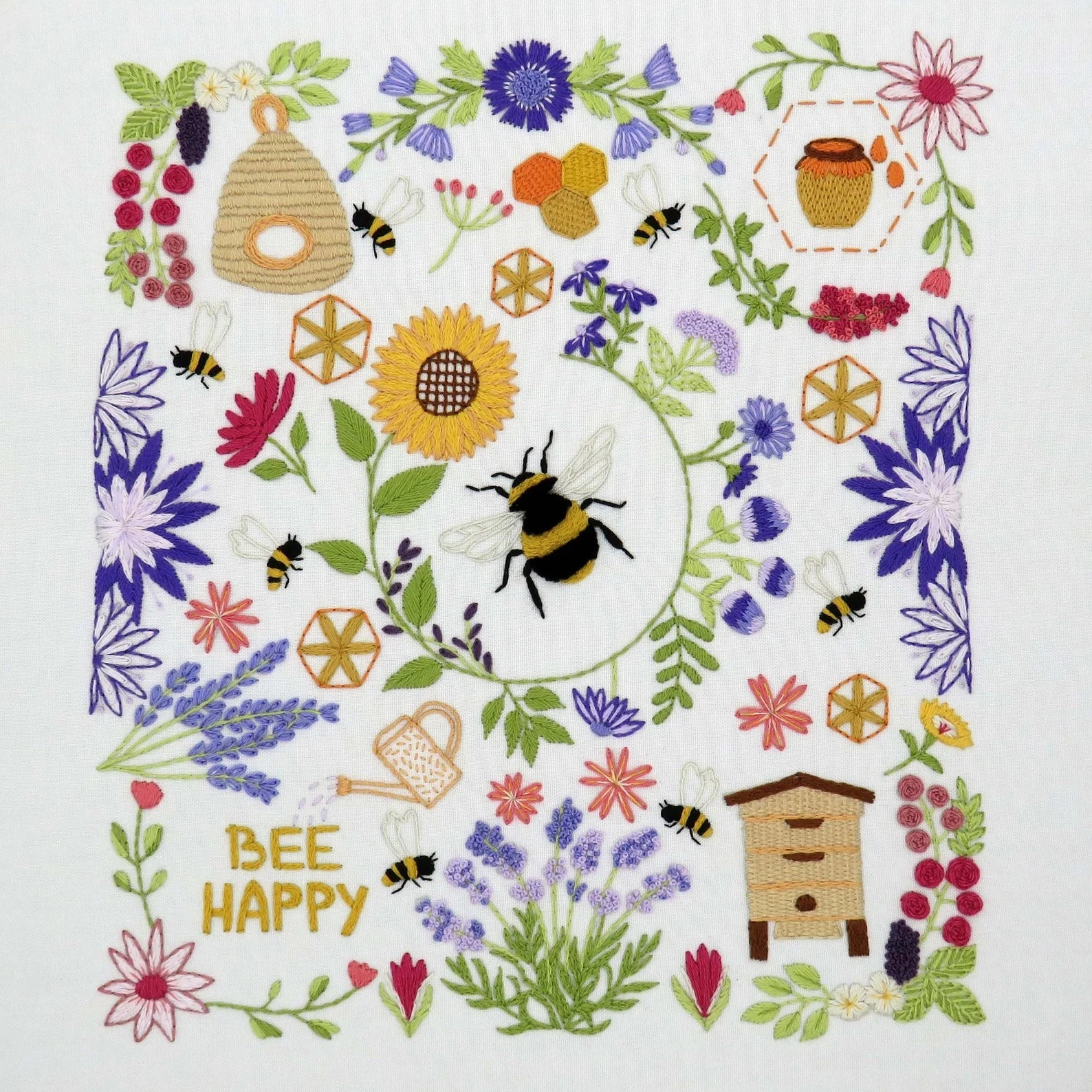 Decorative design with bees, flowers, and honeycomb elements on a white background.