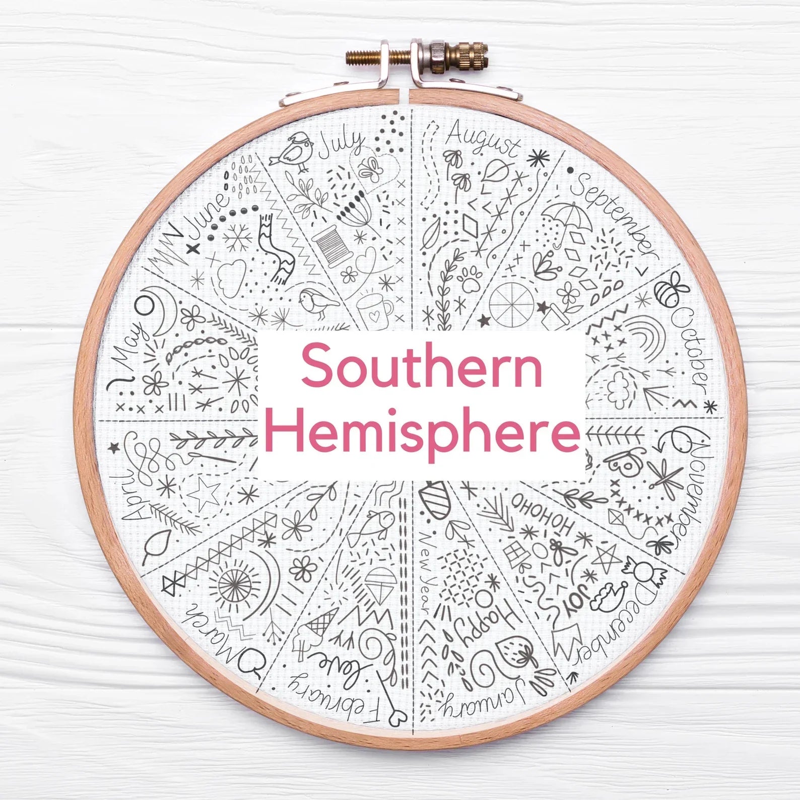 Embroidery hoop with a Southern Hemisphere calendar design on a white background
