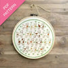 Embroidery hoop with dog pattern on a wooden surface, labeled 'PDF Pattern'.