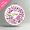 Embroidery hoop with floral and bird design on a white background, labeled 'PDF Pattern'.