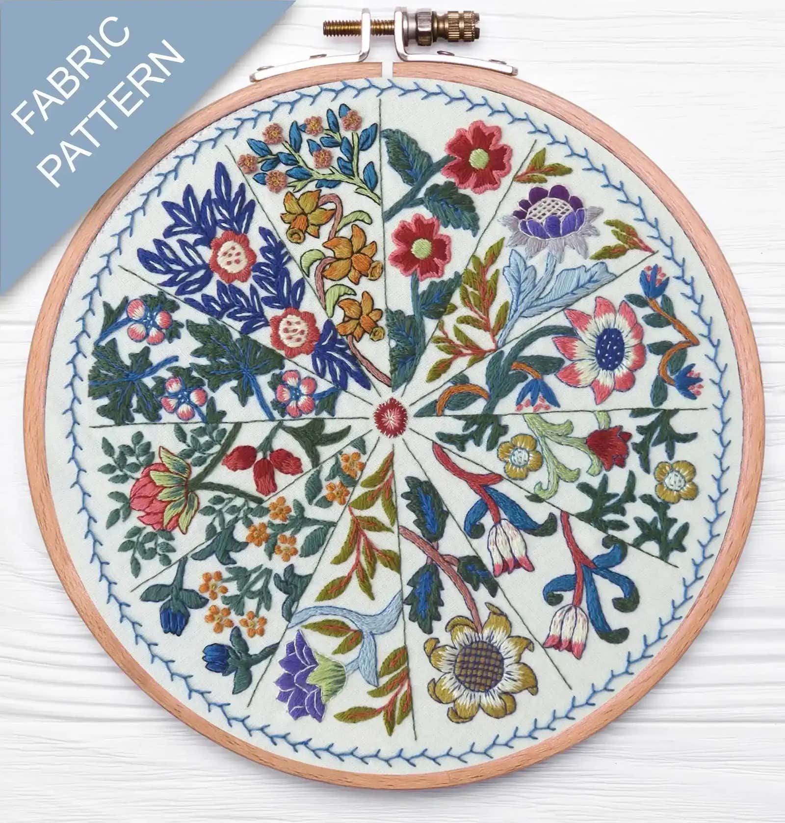 Embroidery hoop with floral pattern on fabric