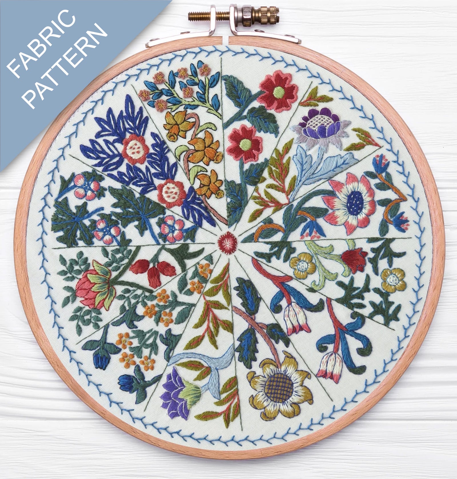 Embroidery hoop with floral pattern on fabric