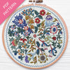 Embroidery hoop with floral pattern on a white background