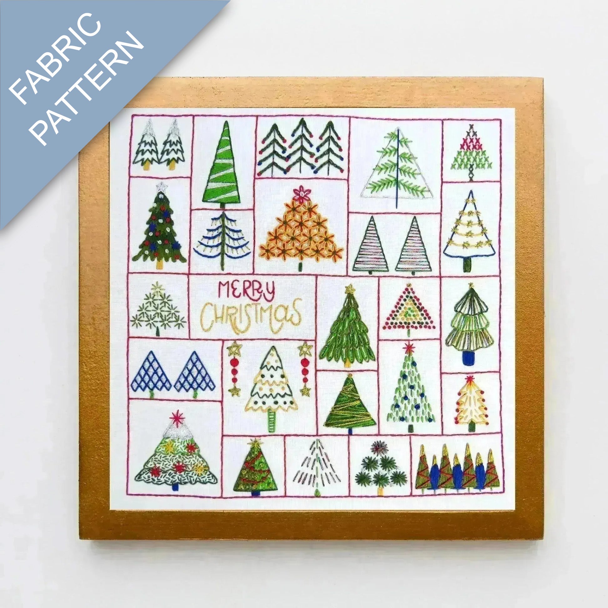 Fabric pattern with Christmas tree designs and 'Merry Christmas' text on a white background.