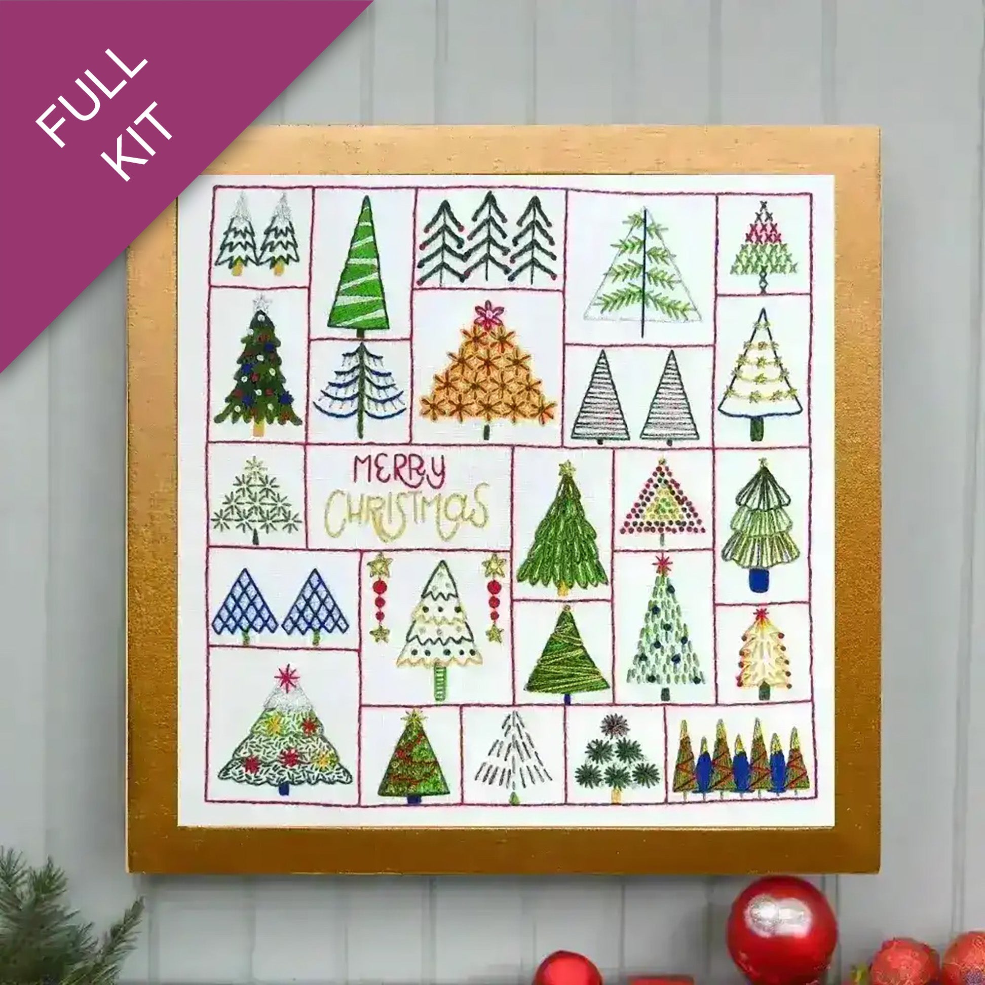 Embroidery kit with various Christmas tree designs and 'Merri Christmas' text on a white background.