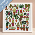 Fabric pattern with various potted plants on shelves