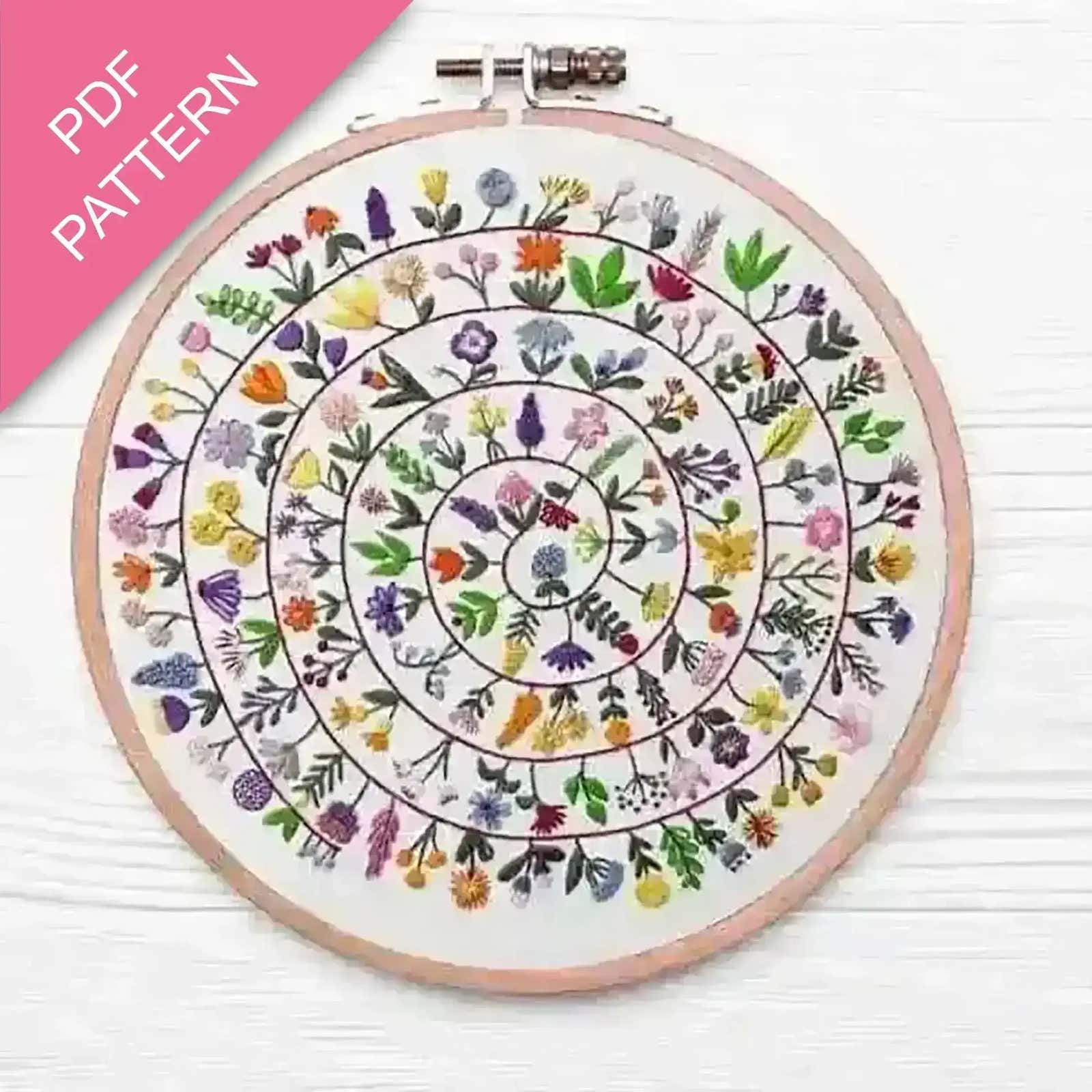 Embroidery hoop with floral pattern on a white background, labeled 'PDF Pattern'.