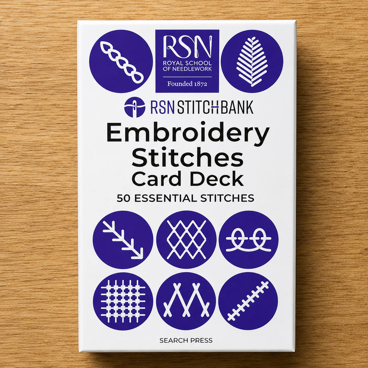 Embroidery Stitches Card Deck packaging on a wooden surface