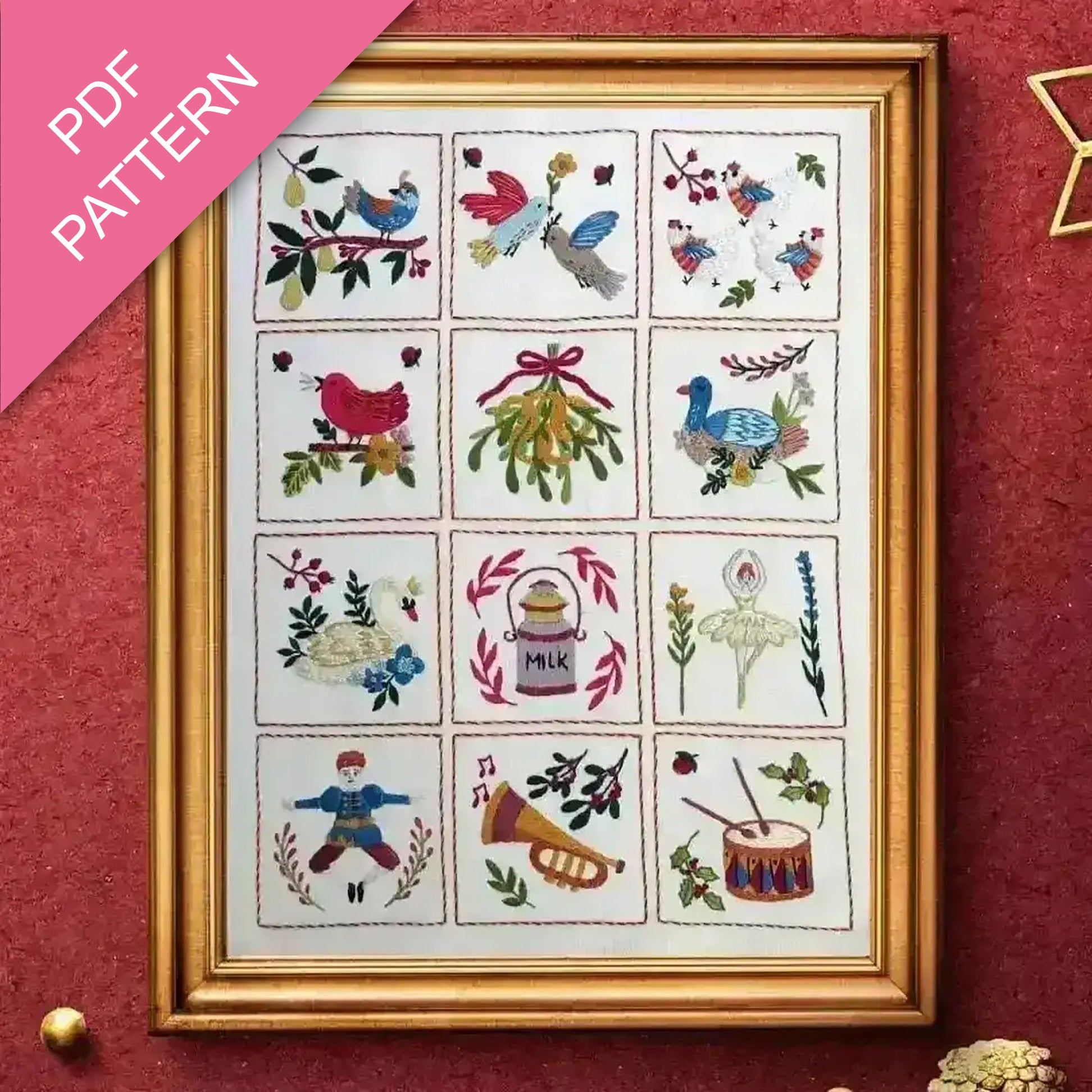 Framed cross-stitch pattern with various designs on a red background