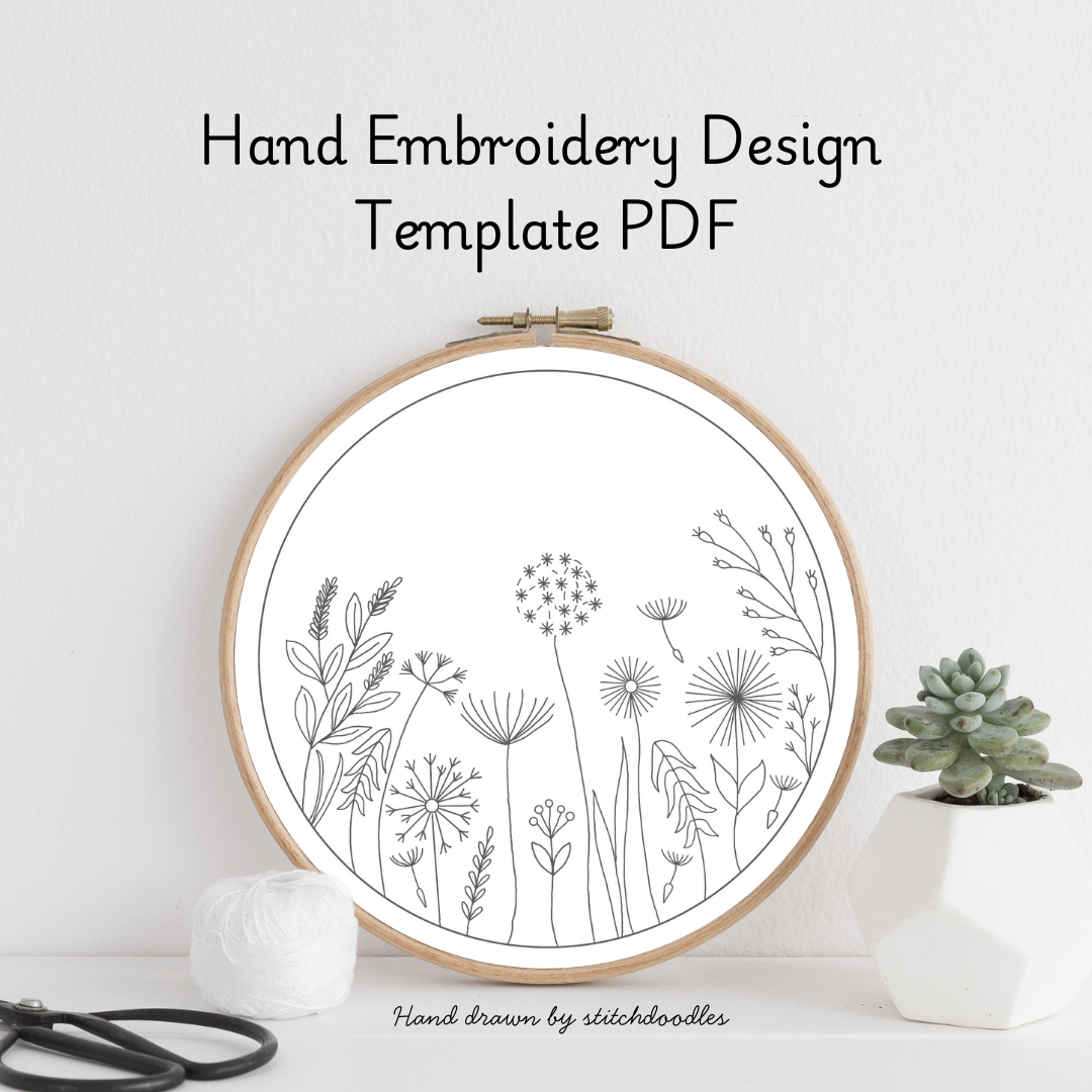 Hand embroidery design template with floral patterns in an embroidery hoop on a white background.